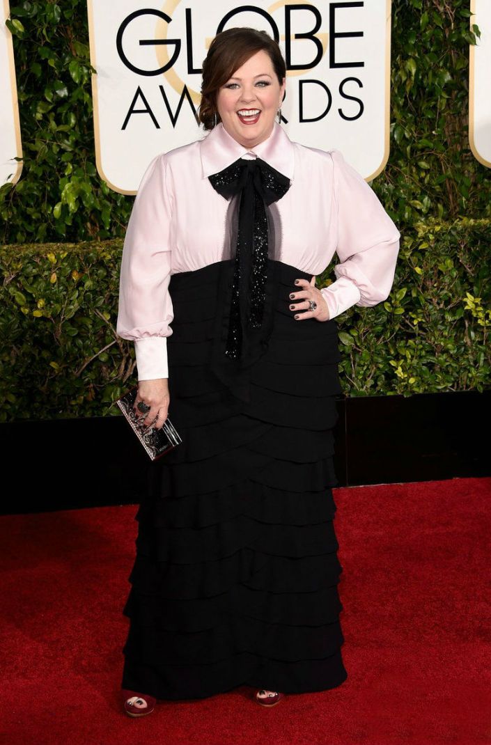 melissa-mccarthy- is wearing various pieces of her own clothing